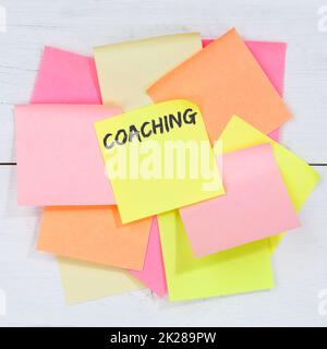 Coaching and mentoring education training workshop learning seminar business concept desk note paper Stock Photo