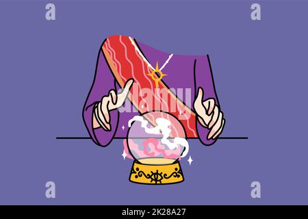 Fortune teller with crystal ball predict fate Stock Photo