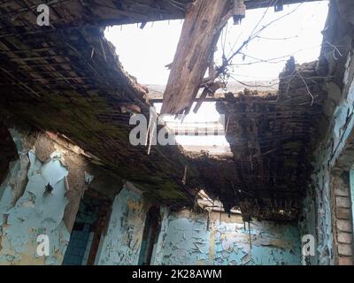 An abandoned dilapidated old building of rural hospital. Stock Photo