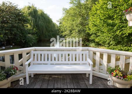 Lonely Bench in the City Park Stock Photo