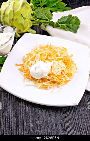 Carrot salad on plate on napkin isolated on white Stock Photo - Alamy