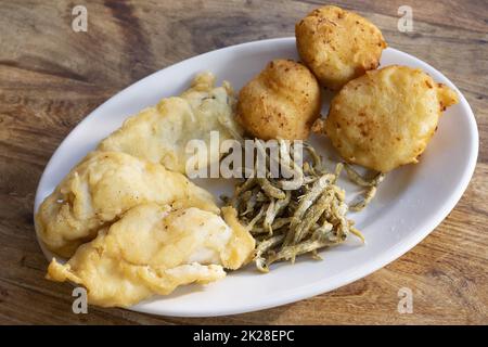 mixed fried fish with battered salt cod, anchovies and zeppole Stock ...