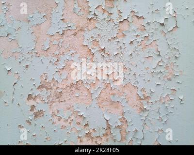 Background texture wall with peeling paint. Peeling old paint wall. Stock Photo