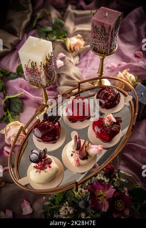 Still life of heart shaped mini cakes Stock Photo