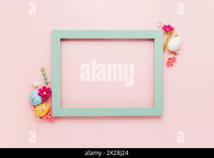 Easter holiday mockup background. Top view from above to Easter eggs with frame Stock Photo