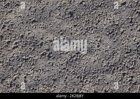 The texture of paving slabs close up. Close-up of paving slabs. Background of frozen cement Stock Photo