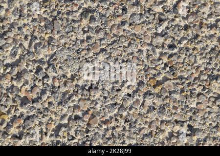 The texture of paving slabs close up. Close-up of paving slabs. Background of frozen cement Stock Photo