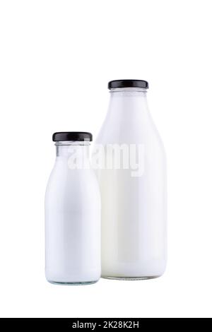 bottles of milk mockup with black cap isolated on white background Stock Photo