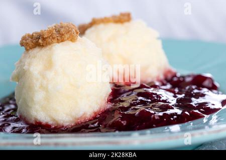 austrian curd noodles on plum sauce Stock Photo