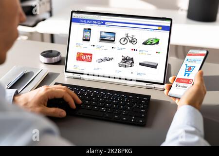 Ecommerce Shopping On Convertible Laptop Stock Photo