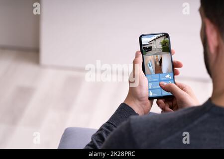 Smart Home CCTV Security On Mobile Phone Stock Photo