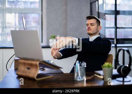 Stretching Office Workout. Desk Stretch Exercise Stock Photo