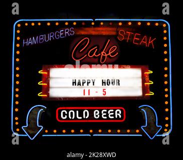 Vintage Neon Cafe Sign on Small Town Restaurant Stock Photo