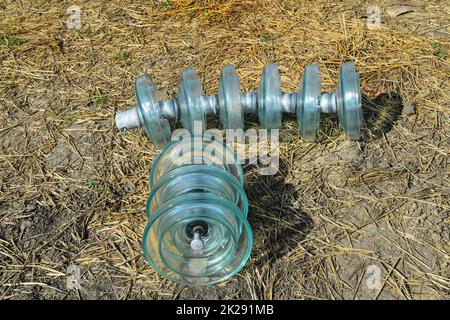 High-voltage insulators of glass insulators. Installation of high-voltage power lines Stock Photo