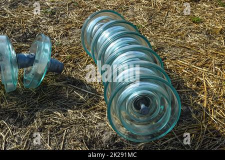 High-voltage insulators of glass insulators. Installation of high-voltage power lines Stock Photo