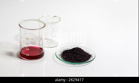 Cosmetic chemicals ingredient on white laboratory table. Potassium Permanganate Liquid, KMnO4 Stock Photo