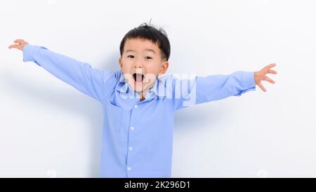 Scared and shocked little boy isolated on white Stock Photo