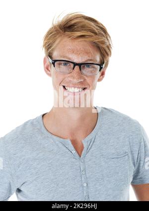 Feeling confident and looking casual. Studio portrait of a handsome young man with ginger hair. Stock Photo