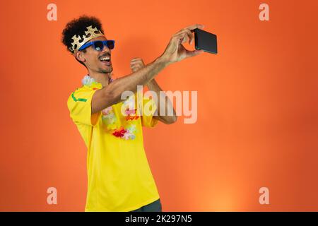 Brazilian Player- Black Man Celebrating With Yellow T Shirt Isolated Stock Photo