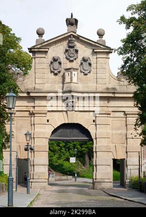 Leopold Gate in Vysehrad Fortress is Baroque from 1669 and is located in Prague, Czech Republic. It is old stonework with crown, eagle, and lion. Stock Photo