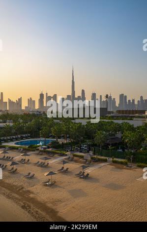 Dubai skyline of the downtown skyscrapers seen from the coast. Panoramic view of downtown Dubai filled with modern skyscrapers in the United Arab Emir Stock Photo