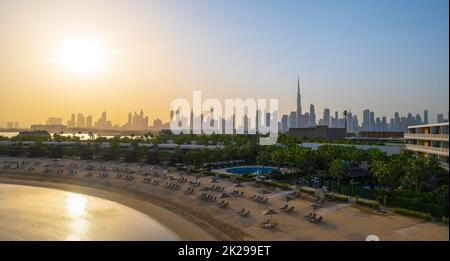 Dubai skyline of the downtown skyscrapers seen from the coast. Panoramic view of downtown Dubai filled with modern skyscrapers in the United Arab Emir Stock Photo