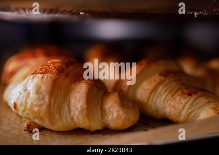 Freshly baked French croissants Stock Photo