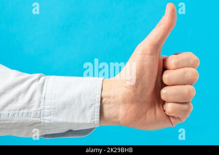 Close up of man hand with thumb up gesture Stock Photo