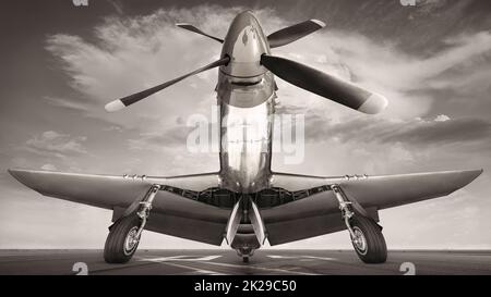 military airplane on a runway ready for take off Stock Photo