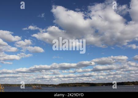 Lake Tyler near Whitehouse TX with Blue Sky and Fluffy Clouds Stock Photo