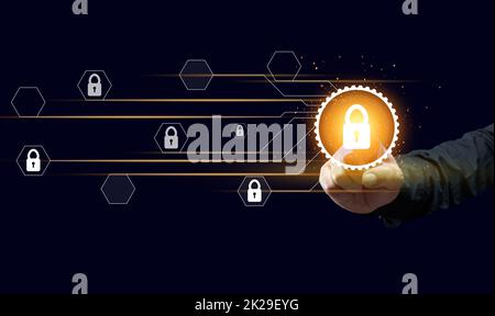 virtual screen with padlock and male hand. The concept of protecting personal information on the network. Cybersecurity and Internet technologies Stock Photo
