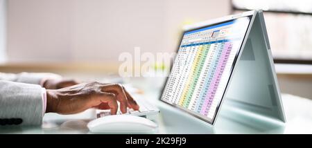 Spreadsheet Data On Hybrid Laptop Screen. Digital Financial Technology ...