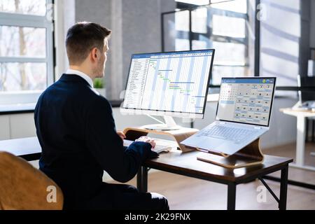 Man Working On Calendar Agenda Schedule Stock Photo