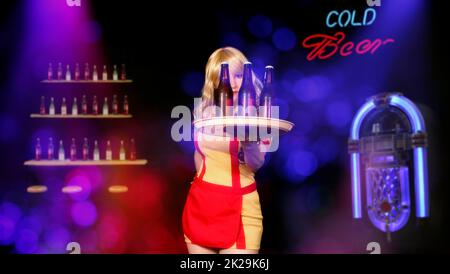 Waitress in Bar With Jukebox and neon lights Stock Photo