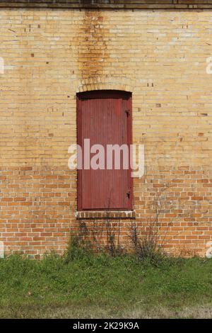 Close-up Building Detail Historical Brick Wall With Doors and Windows Stock Photo