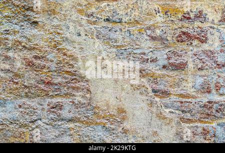 Detailed close up view on very old and weathered brick walls with cracks Stock Photo