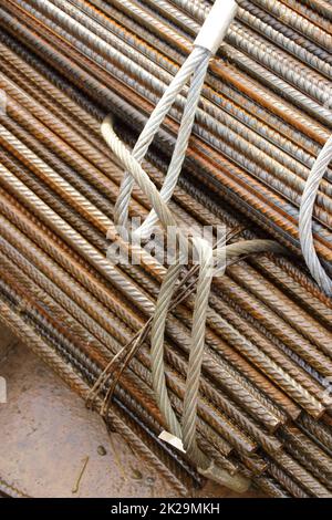 Structural steel was unloaded at a construction site using a metal sling Stock Photo
