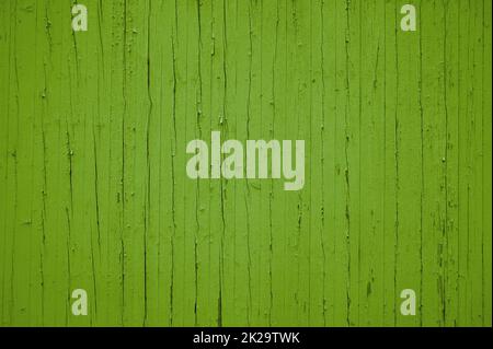 Old green weathered wooden wall with rustic planks Stock Photo