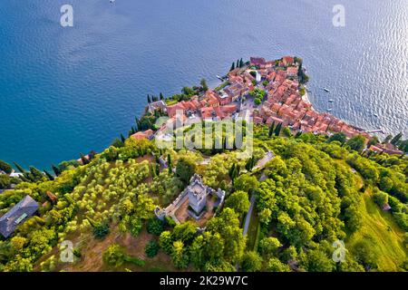 Castello di Vezio tower and town of Varenna on Como lake aerial view Stock Photo