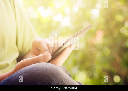 Tablet in hands Stock Photo