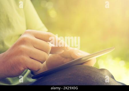 Man holding tablet Stock Photo
