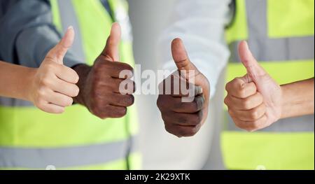 Thumbs up, hands and construction worker diversity in success, trust and support of building design and architecture. Zoom on engineering men and Stock Photo