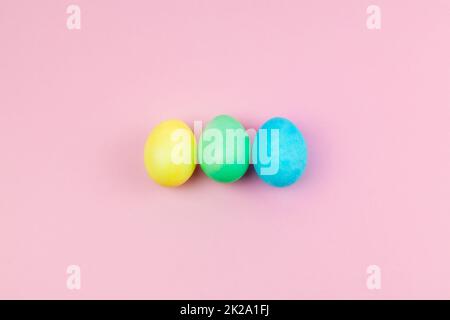 Easter pink composition. Easter eggs on pastel pink background. Minimal concept of Easter. Stock Photo
