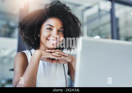 The woman with the business plan. Cropped shot of an attractive young businesswoman in her office. Stock Photo