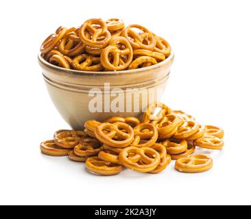Mini pretzels. Crusty salted snack isolated on white background. Stock Photo
