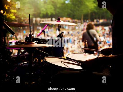 Ready to rock. Cropped shot of a musicians feet on stage at an outdoor music festival. Stock Photo