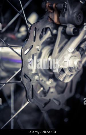 close up motorcycle black rear shock absorber suspension. dirty with clay  marks Stock Photo - Alamy