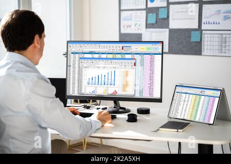Analyst Working With Spreadsheet Business Data Stock Photo
