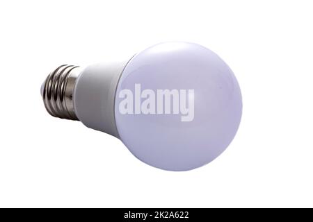 A white LED lamp with an E27 base lies on a white insulated background Stock Photo