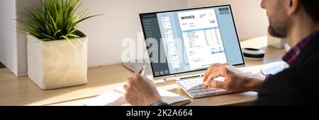 Accountant Using Online E Invoice Software Stock Photo